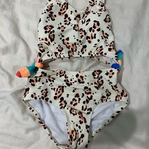 Leopard swimsuit.